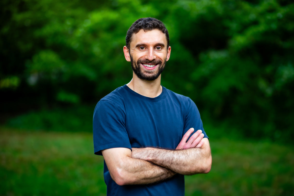 Josh Rosenfeld, founder of GiddyBox, smiling outdoors.