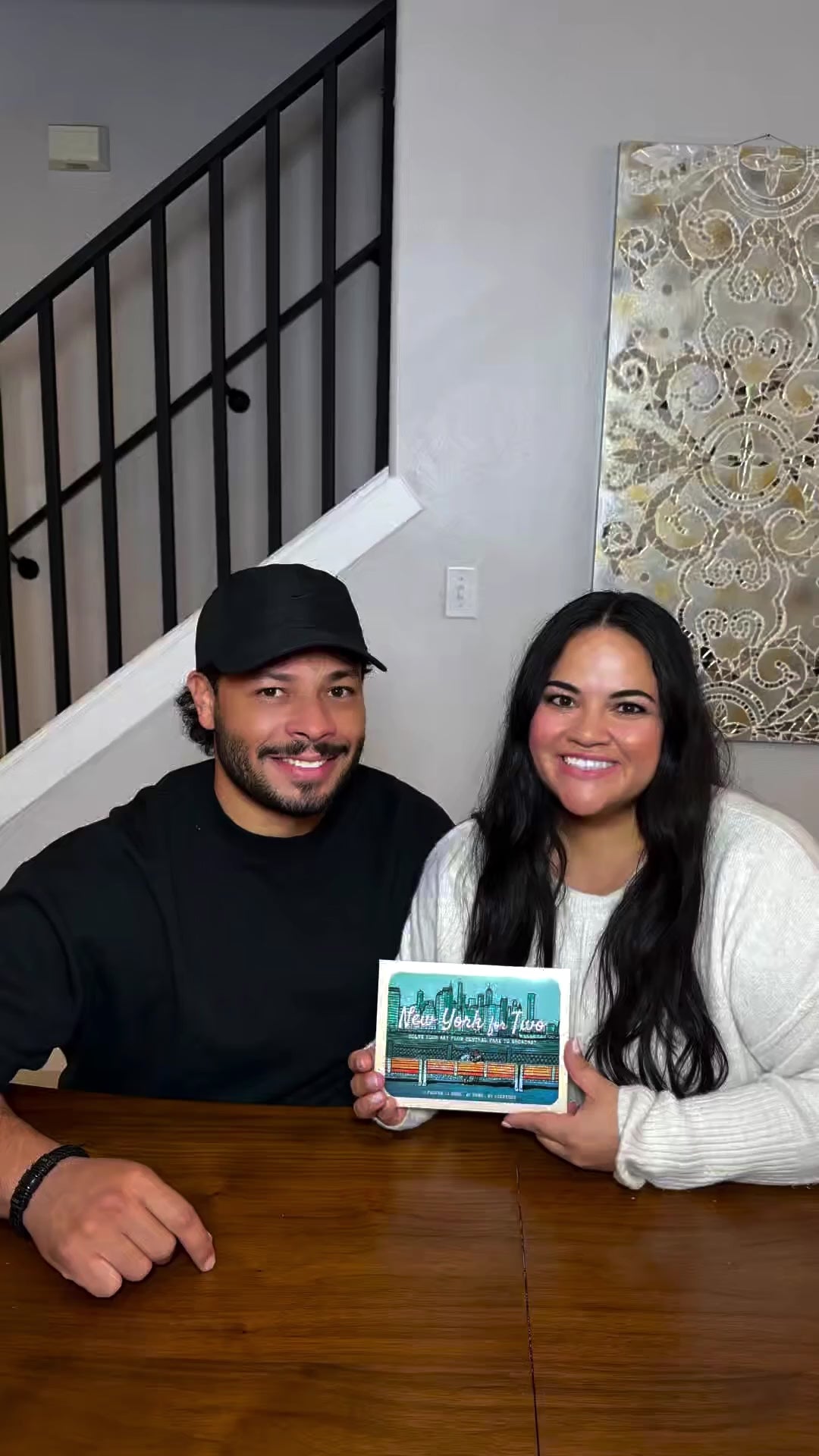 Load video: A video of a couple's experience playing New York for Two.